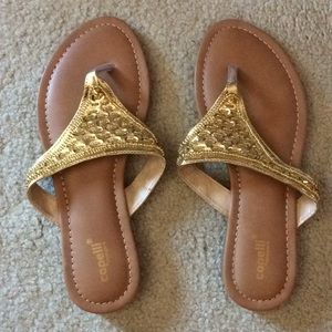 Gold flipflops sandals with gold sequins